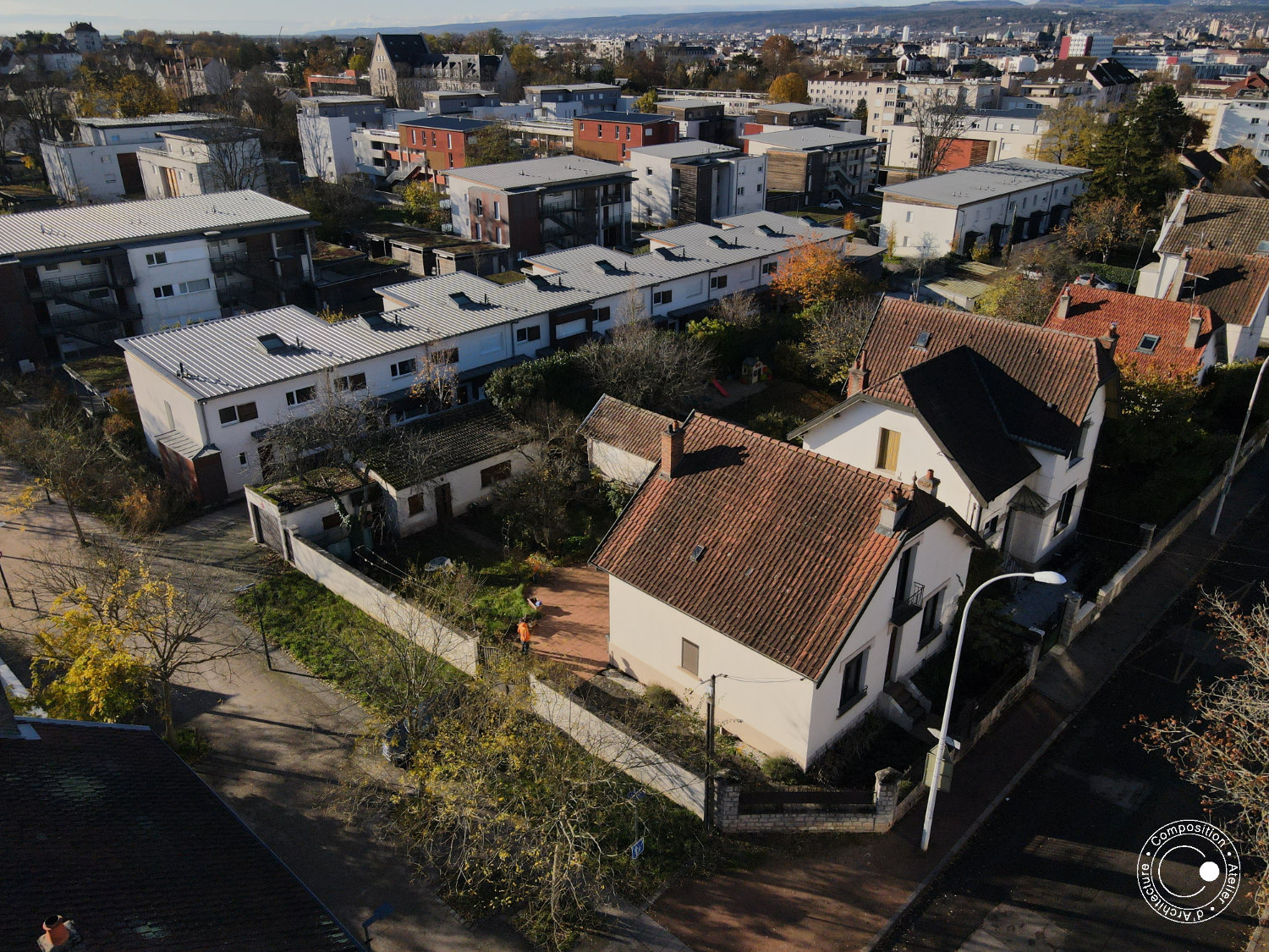 Bouton pour atteindre le descriptif du projet de restructuration d'un pavillon à Dijon